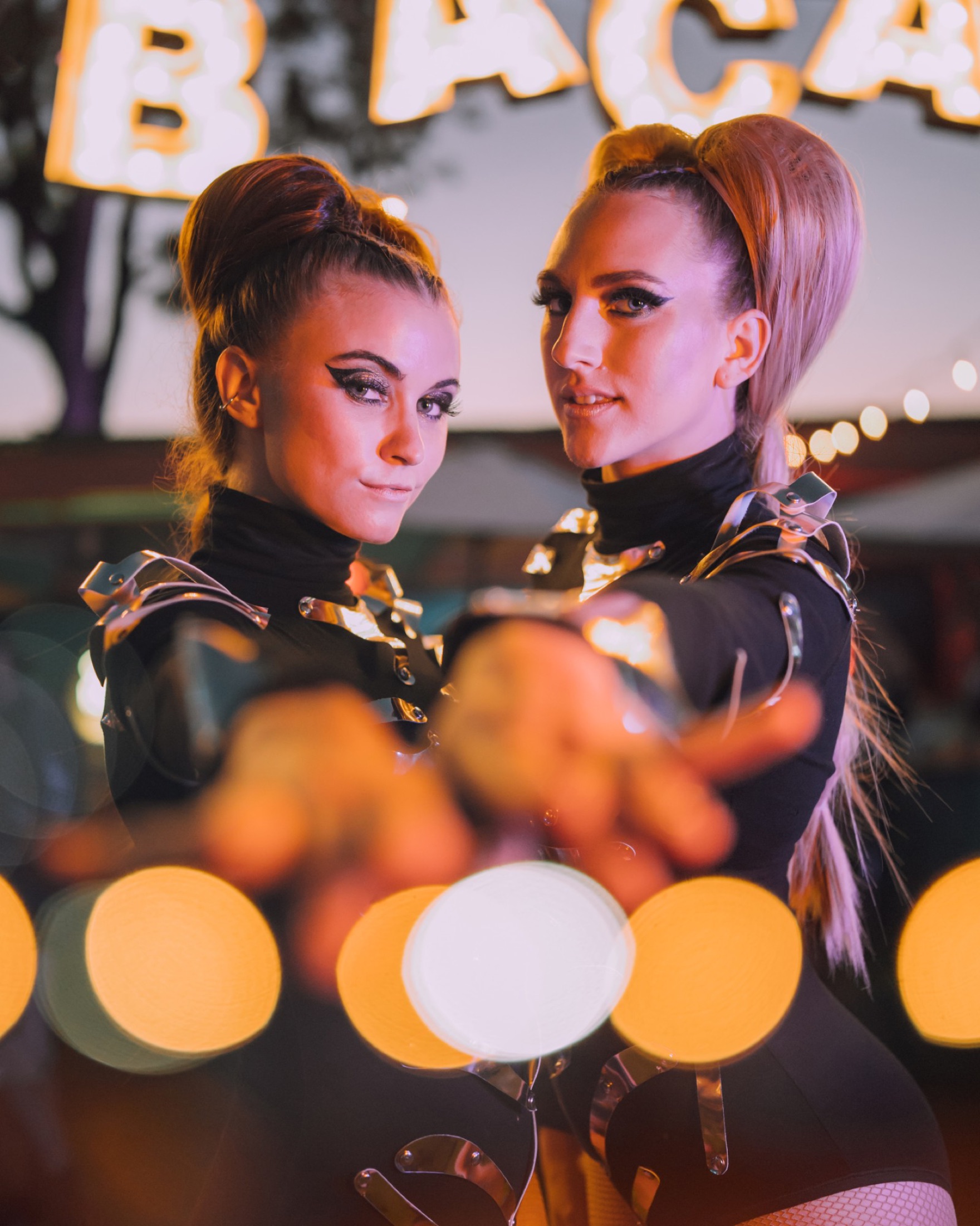 Dancers under the Bacardí marquee lights