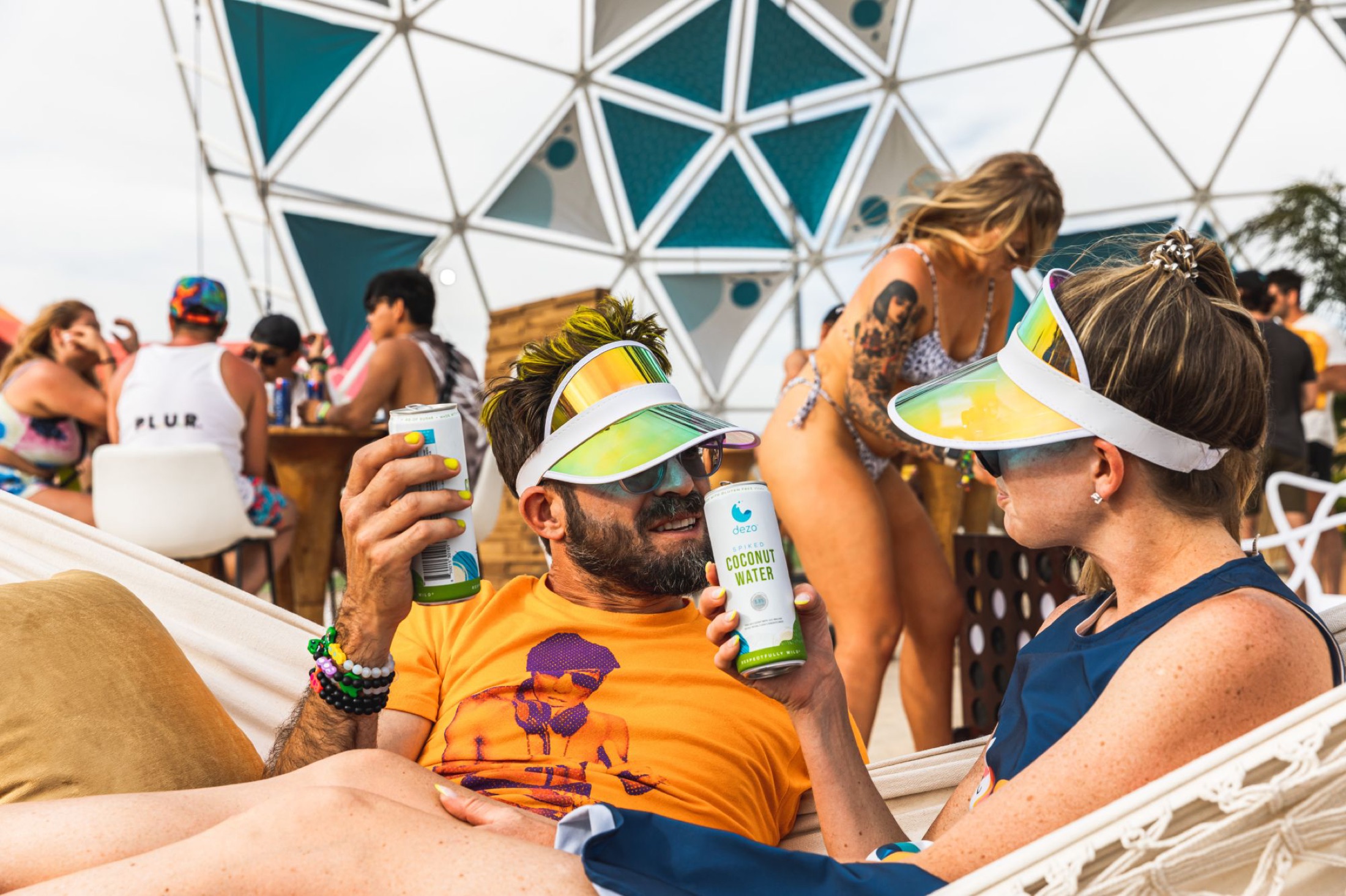 Dezo spiked coconut water in the hammock lounge under the dome